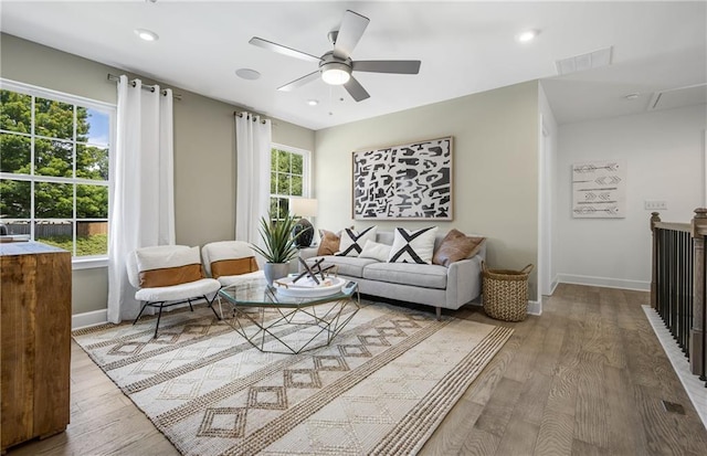 317 Foxglove Way, Mcdonough, GA 30253 - living room featuring ceiling fan, baseboards, wood finished floors, and recessed lighting