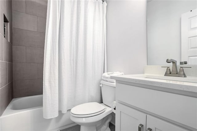 full bathroom featuring vanity, toilet, and shower / bathtub combination with curtain