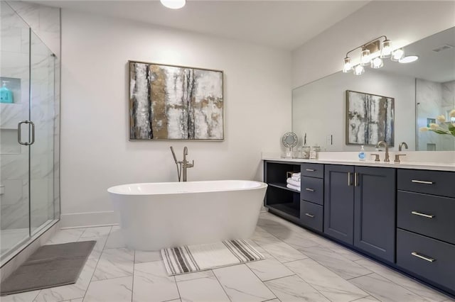 bathroom with vanity and independent shower and bath