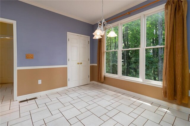 5287 Wild Indigo Way, Acworth, GA 30102 - unfurnished dining area featuring a chandelier, crown molding, and healthy amount of natural light