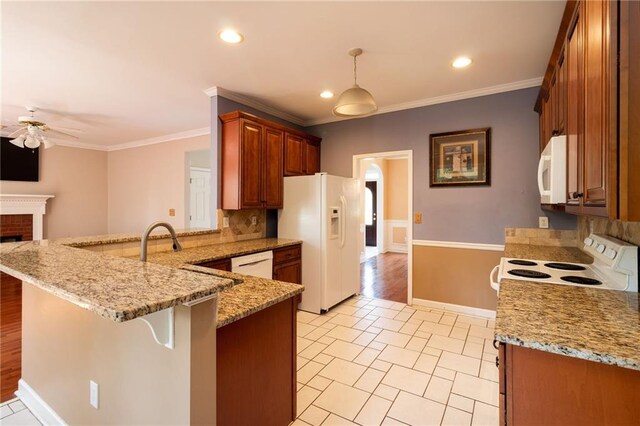5287 Wild Indigo Way, Acworth, GA 30102 - kitchen with white appliances, ceiling fan, a peninsula, backsplash, and ornamental molding