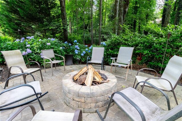 5287 Wild Indigo Way, Acworth, GA 30102 - view of patio / terrace with an outdoor fire pit