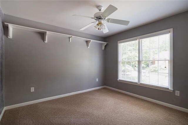 5287 Wild Indigo Way, Acworth, GA 30102 - carpeted empty room with baseboards and a ceiling fan