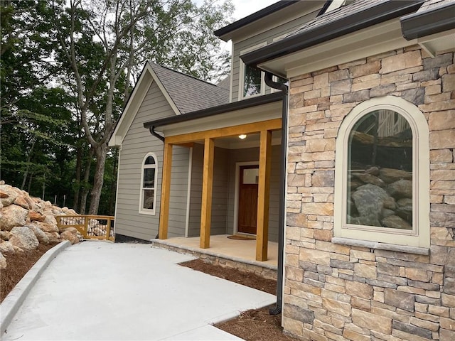 property entrance with a patio area