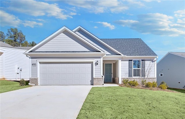 craftsman house with a garage and a front yard