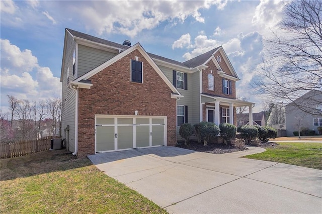 view of home's exterior with a lawn, driveway, fence, a garage, and brick siding