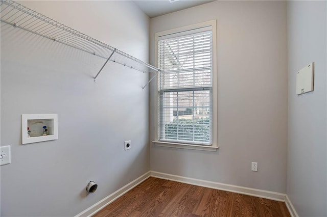 washroom with baseboards, laundry area, hookup for a washing machine, wood finished floors, and hookup for an electric dryer