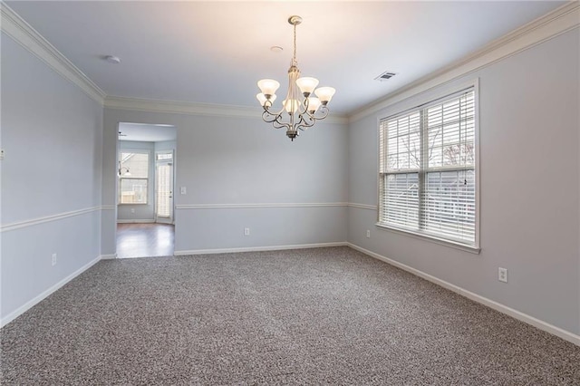 unfurnished room featuring ornamental molding, carpet flooring, visible vents, and a chandelier