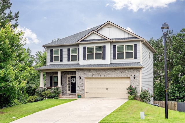 3302 Bellingham Way, Lithia Springs, GA 30122 - craftsman-style house featuring an attached garage, a porch, concrete driveway, brick siding, and board and batten siding