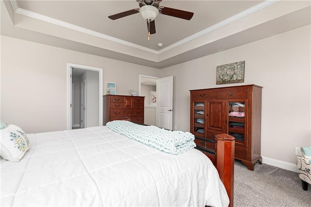 3302 Bellingham Way, Lithia Springs, GA 30122 - bedroom featuring light carpet, ornamental molding, a ceiling fan, and a tray ceiling