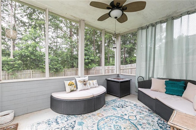 3302 Bellingham Way, Lithia Springs, GA 30122 - sunroom / solarium with an outdoor living space with a fire pit, healthy amount of natural light, and a ceiling fan