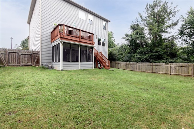 3302 Bellingham Way, Lithia Springs, GA 30122 - back of house featuring a sunroom, a fenced backyard, and stairway