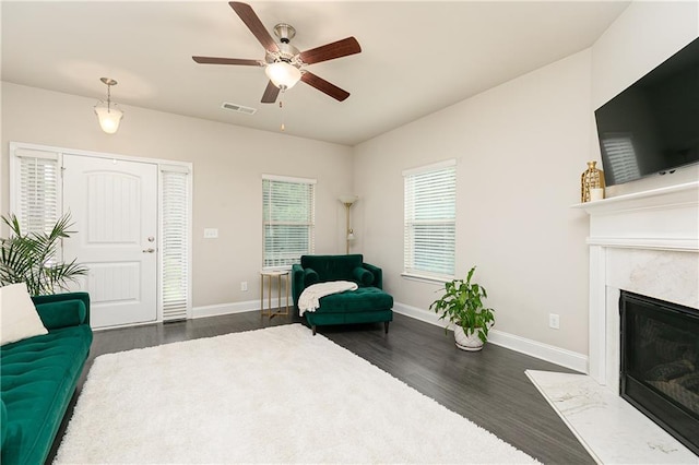 3302 Bellingham Way, Lithia Springs, GA 30122 - living room featuring plenty of natural light, dark wood-type flooring, and a ceiling fan
