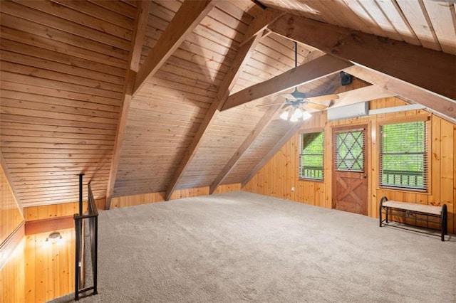 bonus room featuring carpet flooring, wooden walls, vaulted ceiling with beams, and wood ceiling