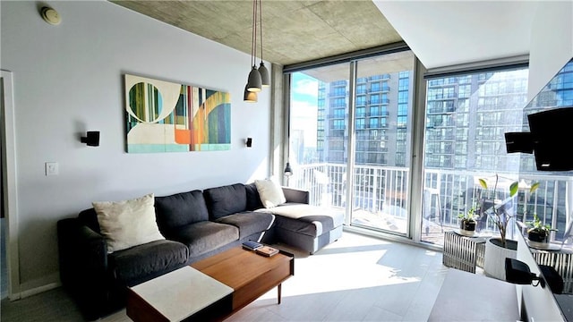 living area with floor to ceiling windows