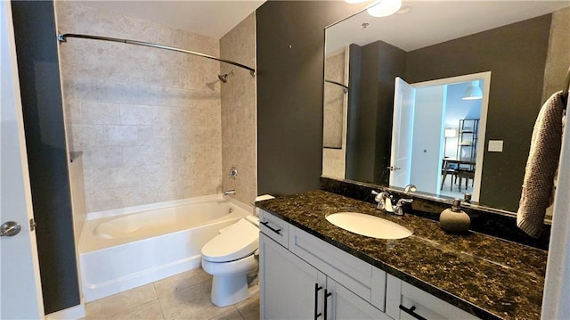 bathroom with vanity, tile patterned floors, toilet, and shower / tub combination