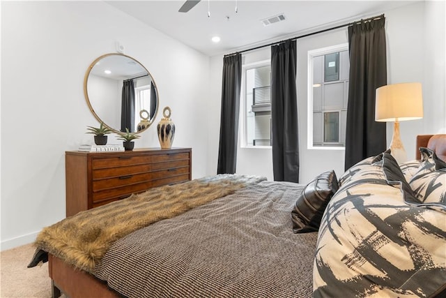 carpeted bedroom featuring ceiling fan