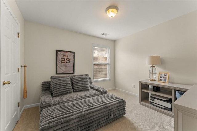 bedroom featuring light colored carpet