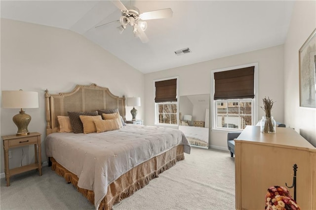 carpeted bedroom with lofted ceiling and ceiling fan