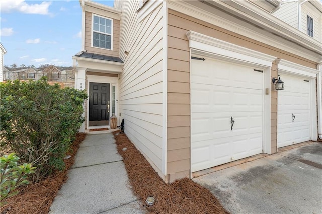 entrance to property with a garage