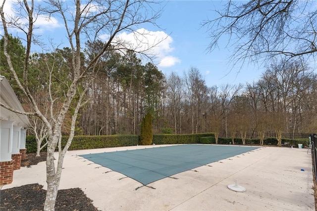 view of pool featuring a patio