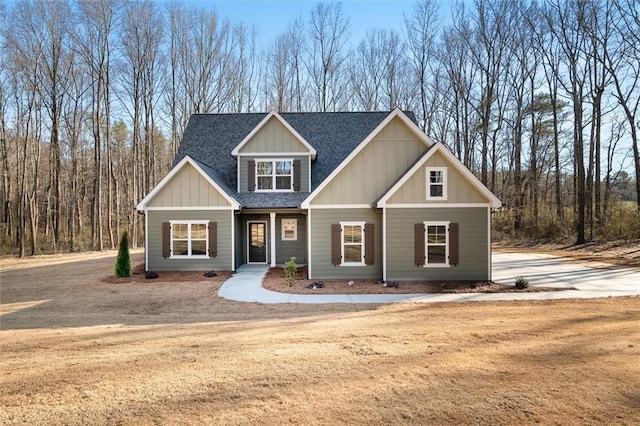 473 Nugget Rd, Carrollton, GA 30117 - craftsman-style house featuring dirt driveway, board and batten siding, and roof with shingles