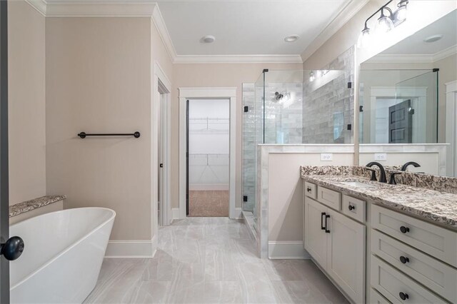 473 Nugget Rd, Carrollton, GA 30117 - full bath featuring vanity, a freestanding bath, a spacious closet, ornamental molding, and a stall shower