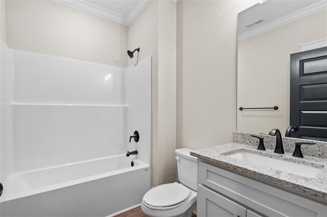473 Nugget Rd, Carrollton, GA 30117 - full bathroom with toilet, visible vents, vanity, ornamental molding, and washtub / shower combination