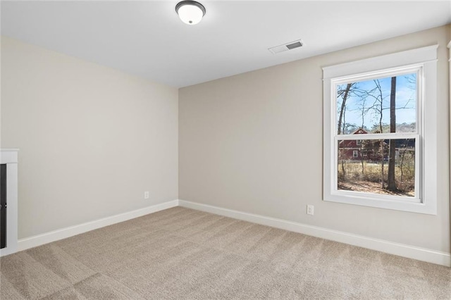 473 Nugget Rd, Carrollton, GA 30117 - carpeted spare room featuring visible vents and baseboards