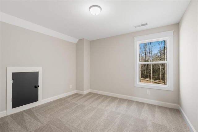 473 Nugget Rd, Carrollton, GA 30117 - carpeted spare room with visible vents and baseboards