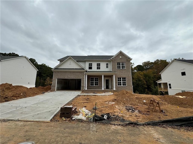 view of front of property with a garage