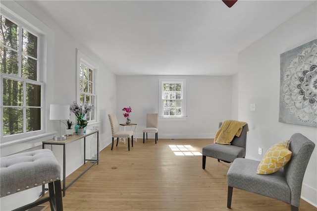 living area with light hardwood / wood-style floors