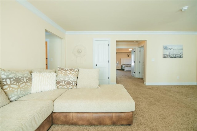 carpeted living room with baseboards and crown molding