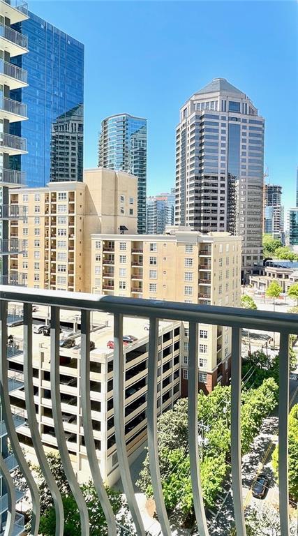 balcony featuring a city view