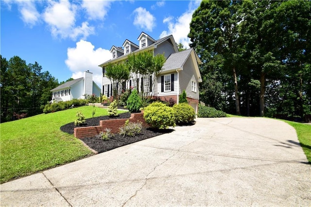5040 Puritan Dr, Sugar Hill, GA 30518 - view of front of home with driveway, a front yard, and a garage