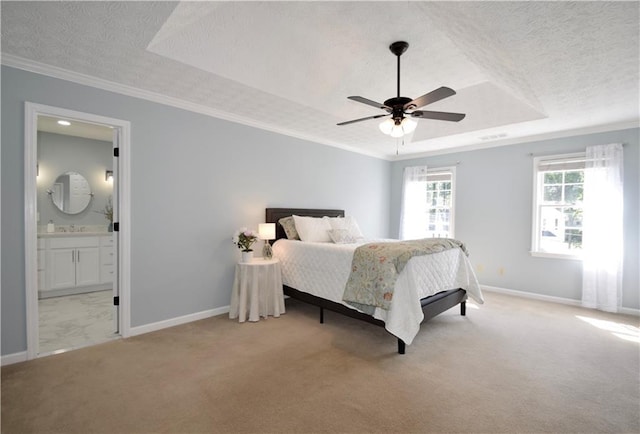5040 Puritan Dr, Sugar Hill, GA 30518 - bedroom with a tray ceiling, carpet flooring, a textured ceiling, ornamental molding, and ensuite bath