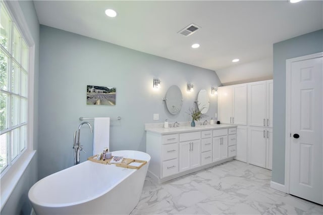 5040 Puritan Dr, Sugar Hill, GA 30518 - full bath featuring marble finish flooring, double vanity, a soaking tub, healthy amount of natural light, and recessed lighting
