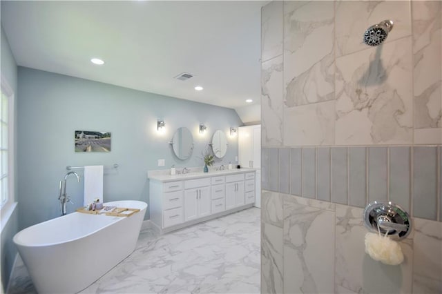 5040 Puritan Dr, Sugar Hill, GA 30518 - full bath with marble finish flooring, a soaking tub, recessed lighting, and double vanity