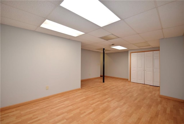 5040 Puritan Dr, Sugar Hill, GA 30518 - finished below grade area with wood finished floors and a paneled ceiling