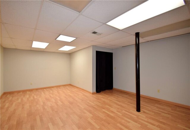 5040 Puritan Dr, Sugar Hill, GA 30518 - finished basement featuring light wood-style floors and a drop ceiling