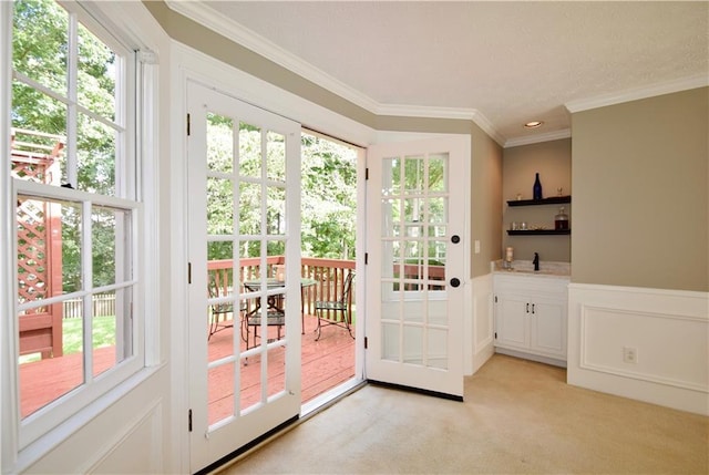 5040 Puritan Dr, Sugar Hill, GA 30518 - entryway with ornamental molding, light colored carpet, and healthy amount of natural light