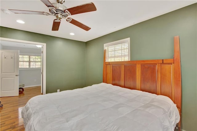 bedroom featuring light wood-style floors, recessed lighting, and ceiling fan