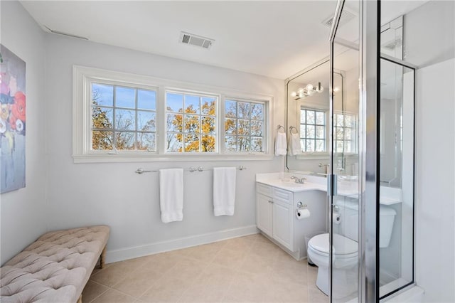 bathroom featuring a notable chandelier, vanity, toilet, and a shower with door