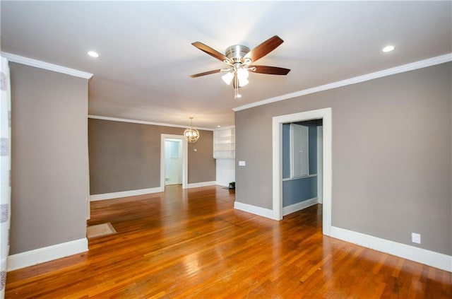 unfurnished room featuring ornamental molding, hardwood / wood-style flooring, and ceiling fan