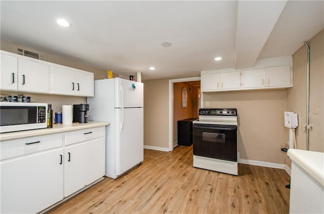 kitchen with light hardwood / wood-style floors, white cabinets, and white appliances