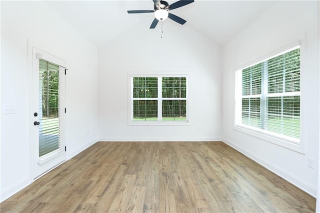 2113 Ella Springs Dr, Covington, GA 30014 - unfurnished room with wood finished floors, ceiling fan, vaulted ceiling, and baseboards