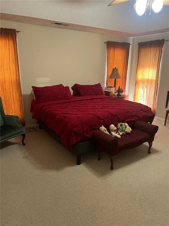 bedroom featuring carpet floors and ceiling fan