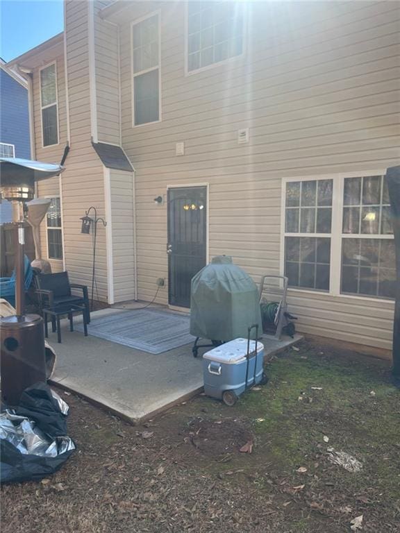 back of house featuring a patio