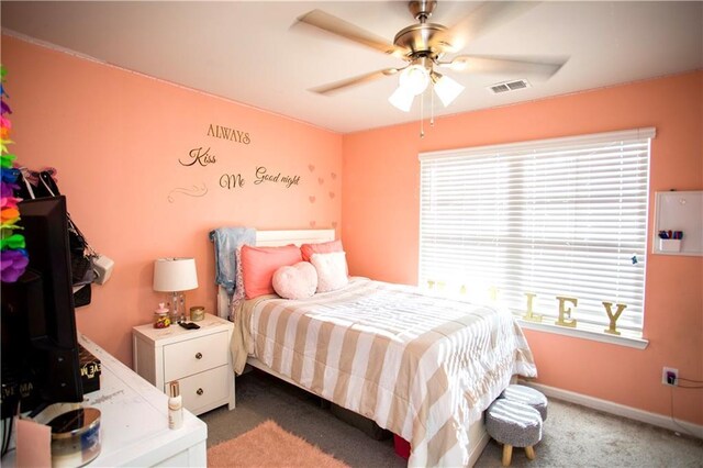 carpeted bedroom with ceiling fan