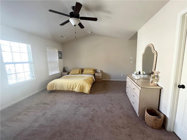 bedroom with carpet floors, lofted ceiling, baseboards, and a ceiling fan